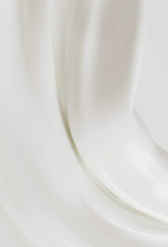 Soft folds of ivory fabric
