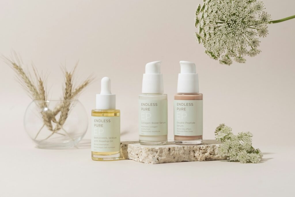 A collection of neutral beauty bottles on a table